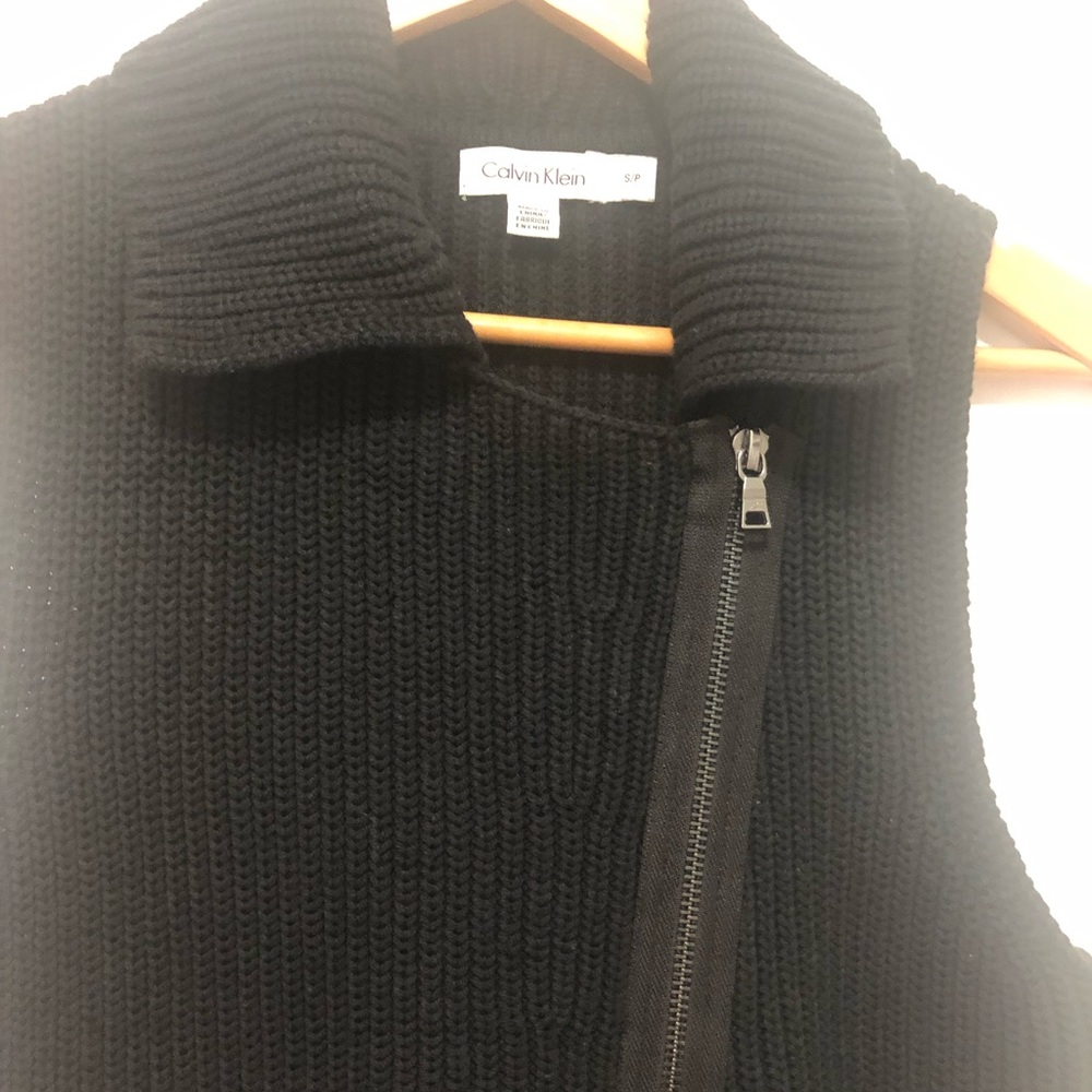 Calvin Klein sleeveless sweater dress with diagonal zipper in front.